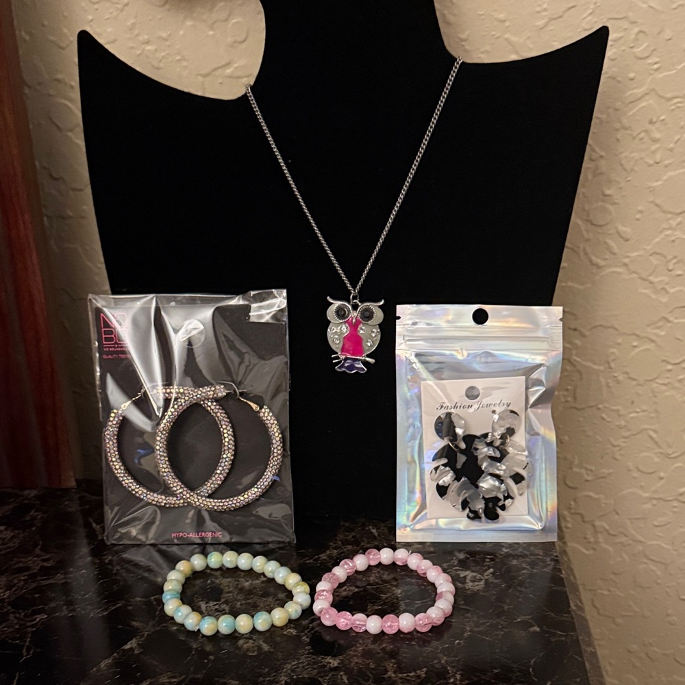 Silver Owl Pendant Necklace with two earrings and two bracelets